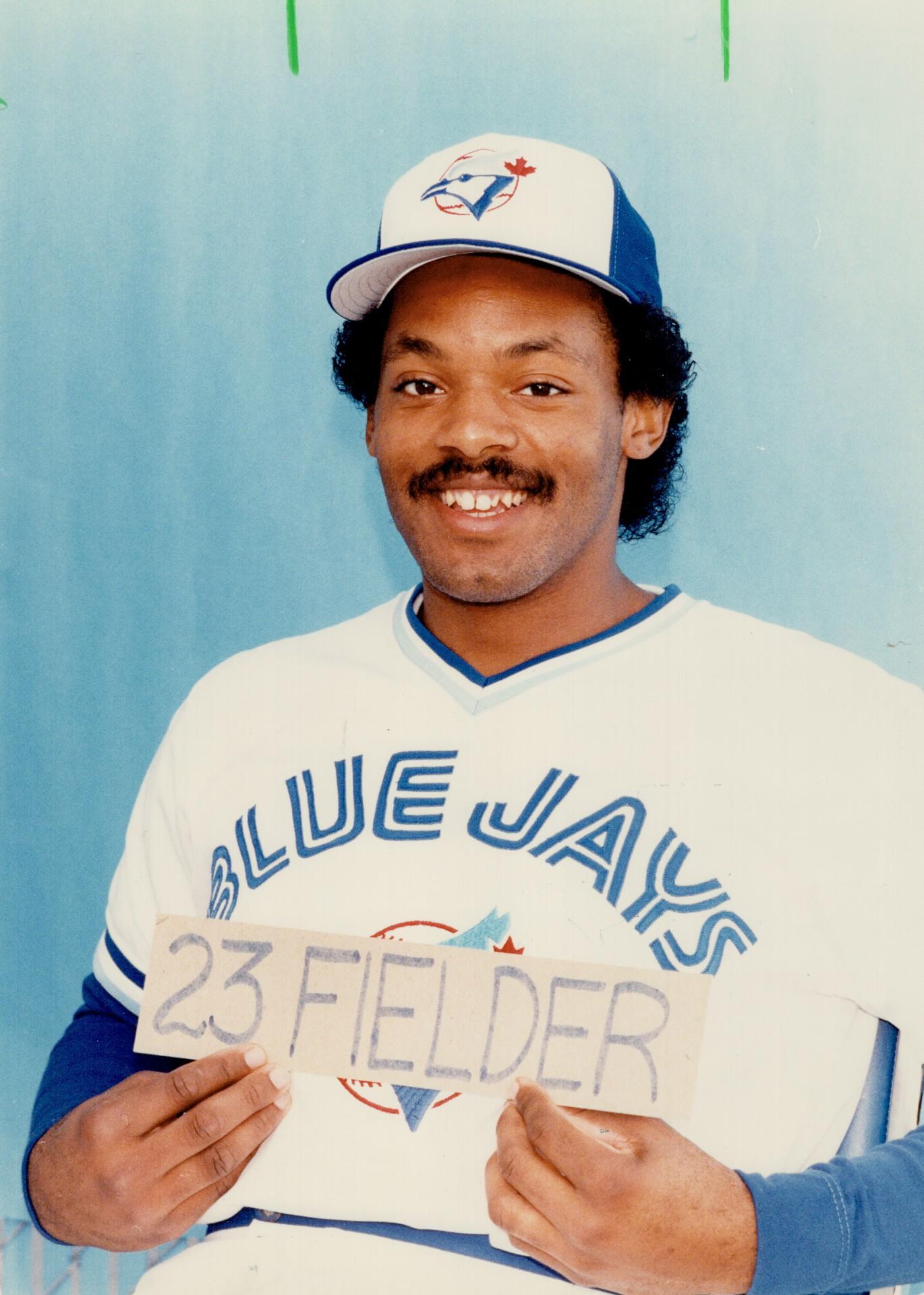 Anything you can do . . . Kelly Gruber, left, had a pair of homers for the  Blue Jays but ex-Jay Cecil Fielder countered with three of his own for the  Tigers