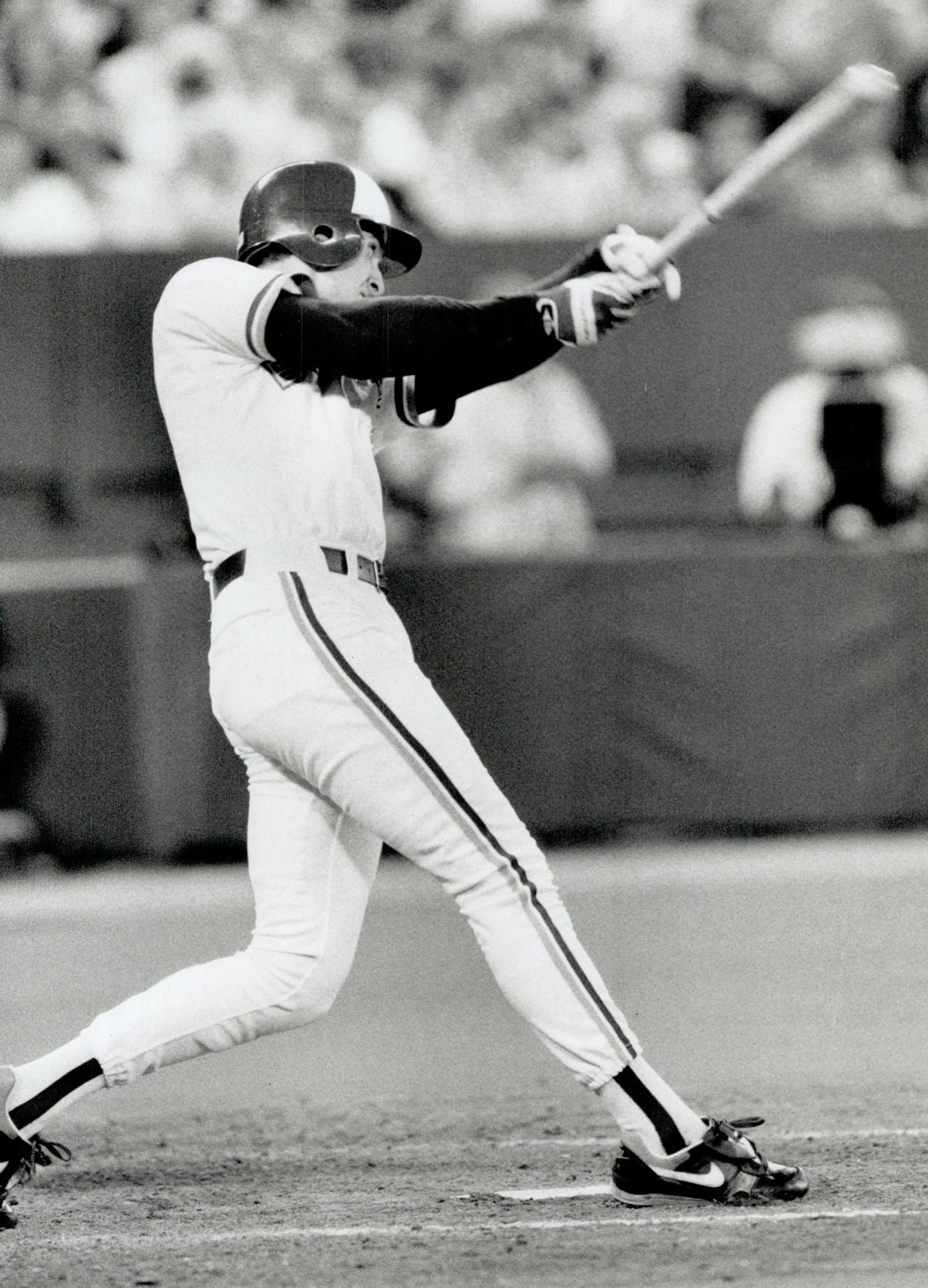 Anything you can do . . . Kelly Gruber, left, had a pair of homers for the  Blue Jays but ex-Jay Cecil Fielder countered with three of his own for the  Tigers