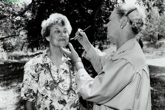 Happy face: Ann Campbell, right, a professional makeup artists, shows Margaret Judge a few tricks of the trade in preparation for High Park senior's program