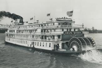 The detlta Queen, last of the old-time Mississippi paddlewheelers, offers ghosts and nostalgia as she plys the river and its tributaries from Cincinna(...)