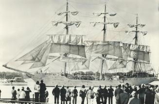 Crowds line Harborfront as the Christian Radich, a 238-foot windjammer from Norway, sails into Toronto