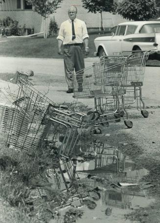 William Bilow Surveys discarded carts