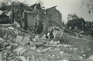 This demolished brick house shows the impact the storm had in Grand Valley