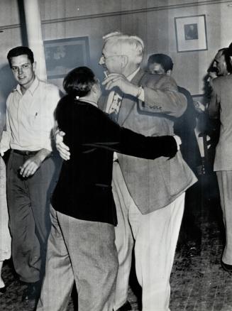 Dancing A Jig, A. R. Mosher, national president of the Canadian Brotherhood of Railway Employees, celebrates the end of the nation-wide strike. He cal(...)