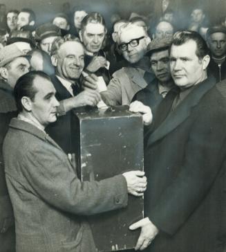 Voting to accept a wage freeze for at least 18 months, workers of Acme Screw and Gear Ltd
