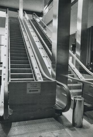 Escalators at the Four Seasons-Sheraton Hotel are unfinished as a result of the elevator strike