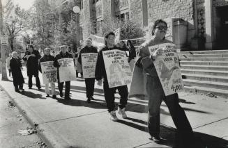 Museum Workers Picket, Striking workers picket the Royal Ontario Museum yesterday after about 90 security guards, cleaners and maintenance workers, me(...)