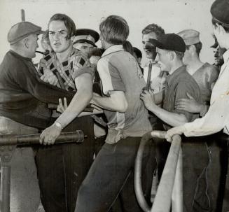 Attempting to stop Canadian Sea men's Union pickets from crossing over to board the C