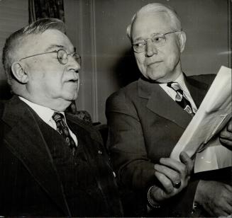 Total Tie-Up of the U.S. railroads is in the hands of these two men. Alvanley Johnston, left, is president of the Brotherhood of Locomotive Engineers.(...)