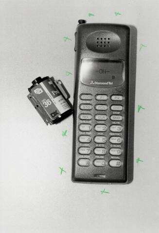 Small miracle: Its maker bills the Diamond Tel 99X as the world's smallest phone