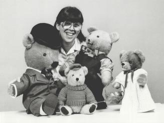 Favorite friends: Diane Walker, who has a collection of 150 teddies, poses with dapper Execu-bear, left, James, centre, and Wilbur, all wearing outfits made by their owner