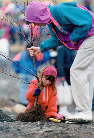 Vanessa Tyson, 6, of Beaches Alternative School and 800 other children celebrate Tree Day