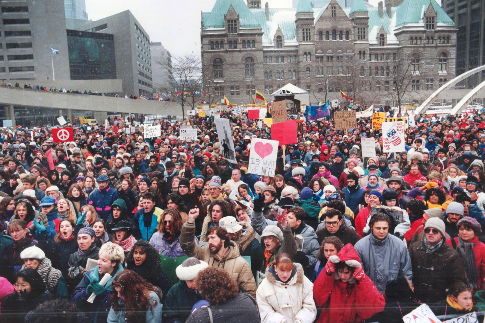 Peace power: Students, war vets and parents with children defy the cold yesterday at Nathan Phillips Square to Protest moves toward a gulf war