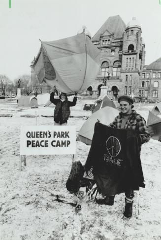 Going home: Activists Scott Graham, 33, hoisting tent, and 17-year-old Jarrad Meshwork prepare to leave their Queen's Park camp yesterday now the gulf war is over