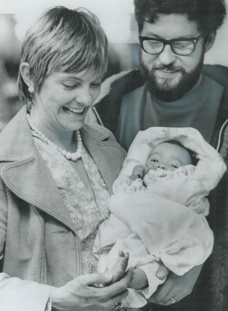 It' the tiny toes that fascinate Pat White of Richmond Hill, holding her new daughter in Montreal last night with her husband, Michael, beaming over h(...)