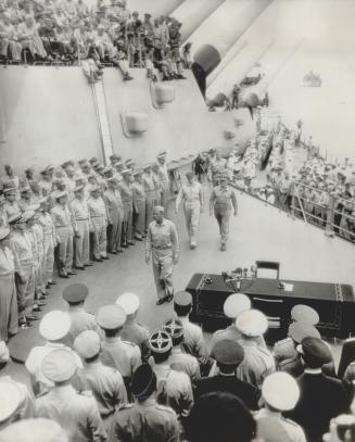 The Conquerors, Gen. Mac Arthur and Adm. Chester Nimitz, are seen centre after boarding U.S.S. Missouri to accept formal Japanese surrender on the ship in Tokyo Bay