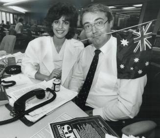 Flagging Spirits!, Maria Ridley, Miss Australia 1985, started her Canadian tour by dropping in recently on the Royal Bank's new money trading room. Wh(...)