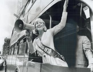 Miss Canada's out for blood, With a loudhailer, Miss Canada (Terry Lynne Meyer) appeals for blood donors from the double-decker bus that carried donor(...)