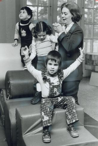 Pre-school blind children at the Ontario Foundation for Visually Impaired Children centre in Toronto play on special inflatable toys in all shapes and(...)