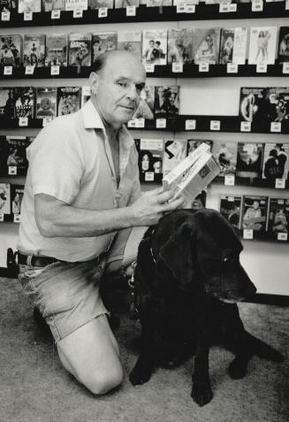 Bud Lambert: Blind store owner is helped by his dog Spike at Oshawa video store