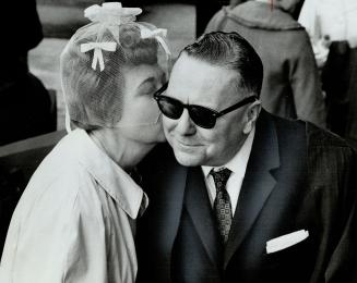 George Mccormick gets kiss from wife, Blind, he won degree just to see if I could do it