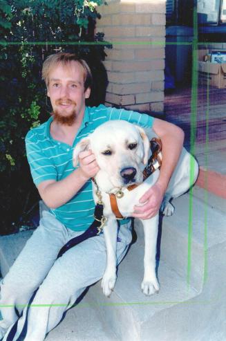 Grey Thompson and his guide dog, Quinby