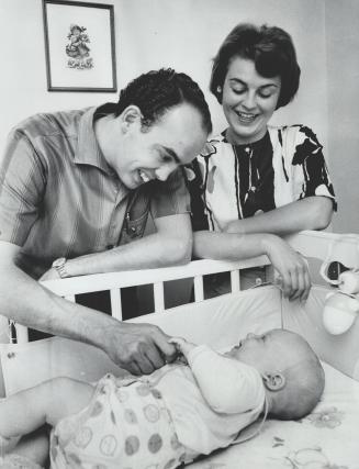 Harry MacKay, Fond Husband And Father With his wife, Margaret, and son Robin, 4 months old