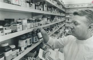 Pills, Pills, Pills, Pills . . .there are so many that can do almost the same jobs. Many pharmacists say that if druggists like Walter Bagan, above, g(...)