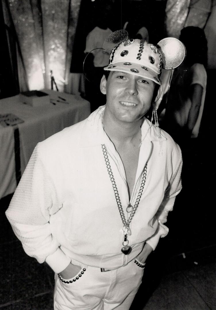 Metropolis designer Scott Mackie, below, in a white Rifat Ozbek jacket and hat he decorated himself