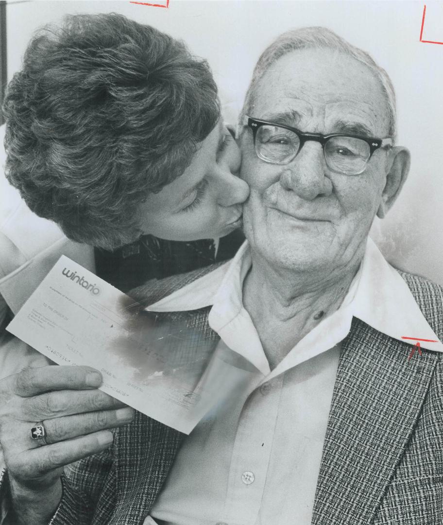 Cottrell and Mrs. M. Craig $100,000 kiss for grand-dad
