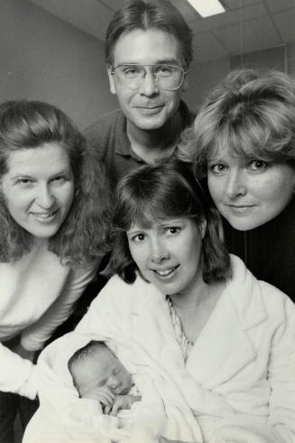 Mother - Anita Rutherford (centre) Husband - Paul Rutherford, Midwives - Peggy Cannon (left) and Carol Cameron, Baby - Rebecca