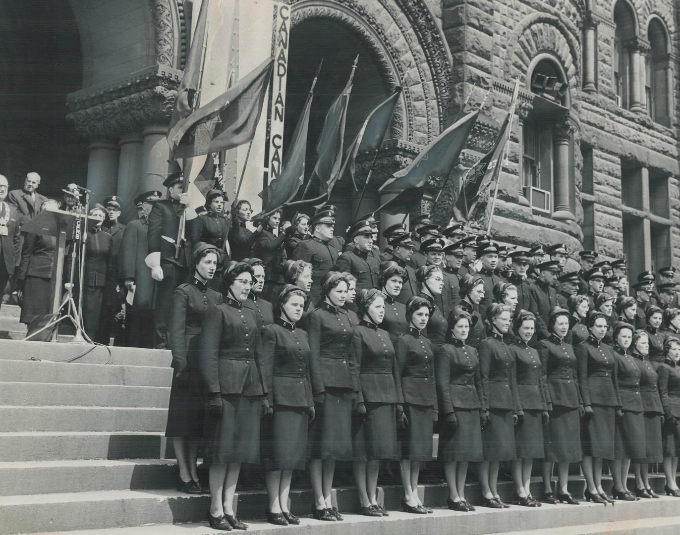 The kickoff of a $745,950 drive, Mayor Philip Givens (left) stands with members of the Salvation Army at City Hall where he officially opened the Army(...)