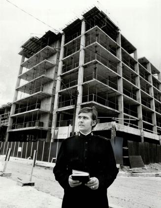 St. Lawrence Neighborhood project towers over Salvation Army Lieut. Ted Palmer