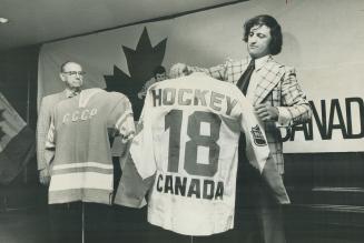 Hockey Trainers Tommy Nayler (left) and Joe Sgro reveal the sweaters that will be worn in next September's world hockey showdown between Russia and Ca(...)