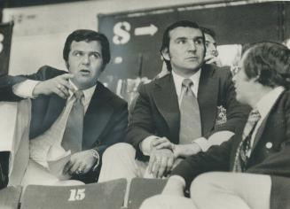 Team canada coach Harry Sinden is an intense observer at Soviet Union's hockey practice in Montreal Forum this morning