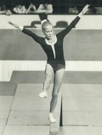 Little Karen shows her stuff. Karen Kelsall of Vancouver, who at 13 is the youngest member of Canada's Olympic gymnastics team, shows fine form in thi(...)