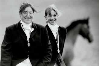 Horsing around: Lindsay Colwell, 13, right, and Kerri Commanda, 19, placed first and third respectively at the 1993 Canadian Preliminary Young Riders Championship in Bromont, Que