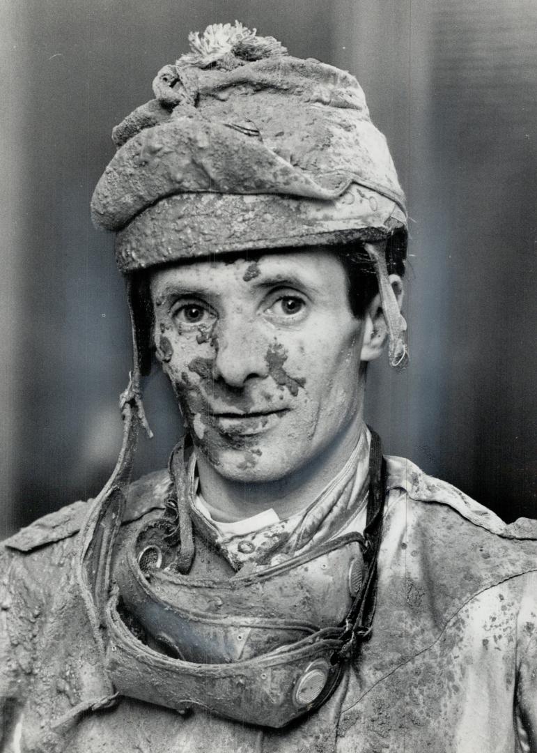 No zip: Mud-splattered jockey John Bell said his mount, Anita's Warrior, usually is a good mudder but failed to show any fire when he ran in the fifth race yesterday