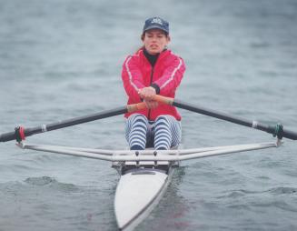 Balmy weather: There's no trace of ice on the lake as Argonauts Rowing Club member Tracey Black gets ready for summer