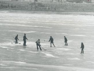 Small boys skate on a big lake, Youngsters play an informal hockey game on the ice of Kelso Lake, in the Kelso Conservation Area near Milton, yesterda(...)