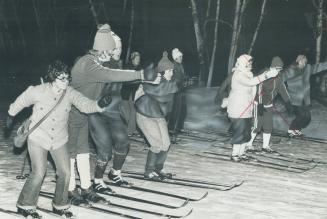 Cross-Country Skiing by Floodlight, That's the only way Seneca could meet demand for lessons last year