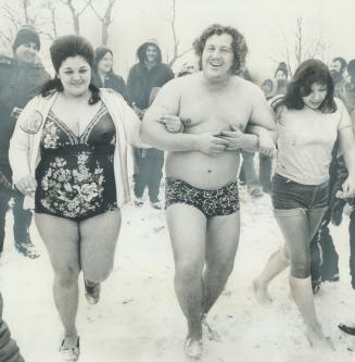 In hamilton, about a dozen members of the Polar Bear Club took annual dip