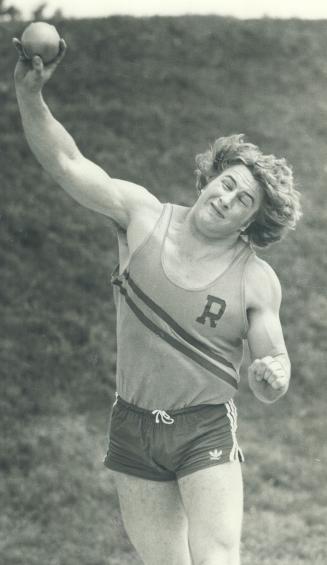Dirk Leers of Richview (below) was putting everything into his shot put
