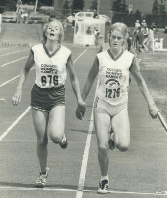 It was a close finish, but Brock's Michelle Fairburn inches out Burlington's Brenda Bowering (left) in 1,500-metre trial