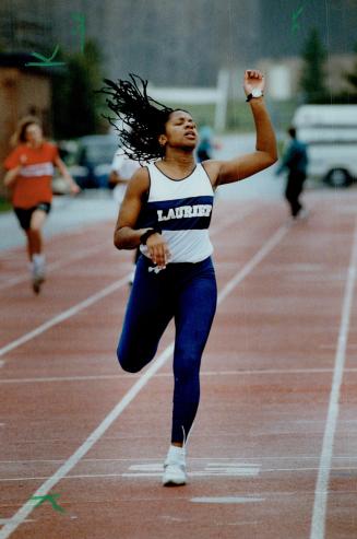 Going all out: Nicole Nightingale of Sir Wilfred Laurier high school hits the finish in the junior girls' 200-metre race at Etobicoke Centennial Stadium