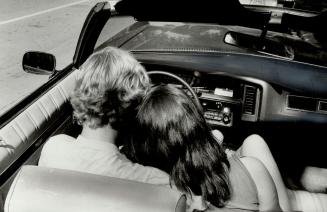 Convertible cuddle: There's something about a convertible and Toronto's lovers' lanes that sets young blood racing