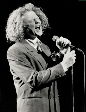Grown-Up soul singer: Mick Hucknall's solo version of 'Holding Back The Years', Simply Red's one North American success, scored a direct emotional hit last night