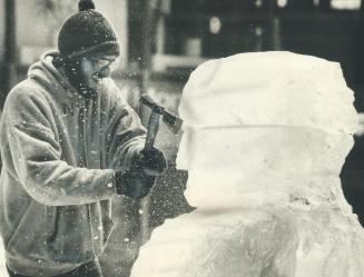 Sculptor's out in the cold. Six students from the Ontario College of Art-including 24-year-old Larry Shereck-are working afternoons this week to creat(...)