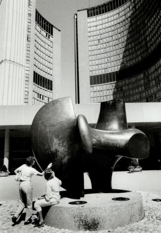 Controversial piece: The hulking bronze sculpture of The Archer caused a public furor when it was brought to grace the square outside Toronto City Hall at taxpayers' expense