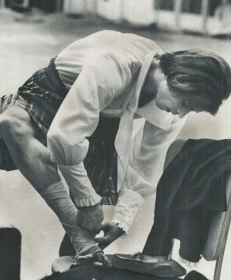 He crocked his andle. . . Ballet dancer Rudolf Nureyev tapes ankle he injured when he slipped in snow while wallking Sunday. Last night he danced in La Sylphide at the O'Keefe Centre